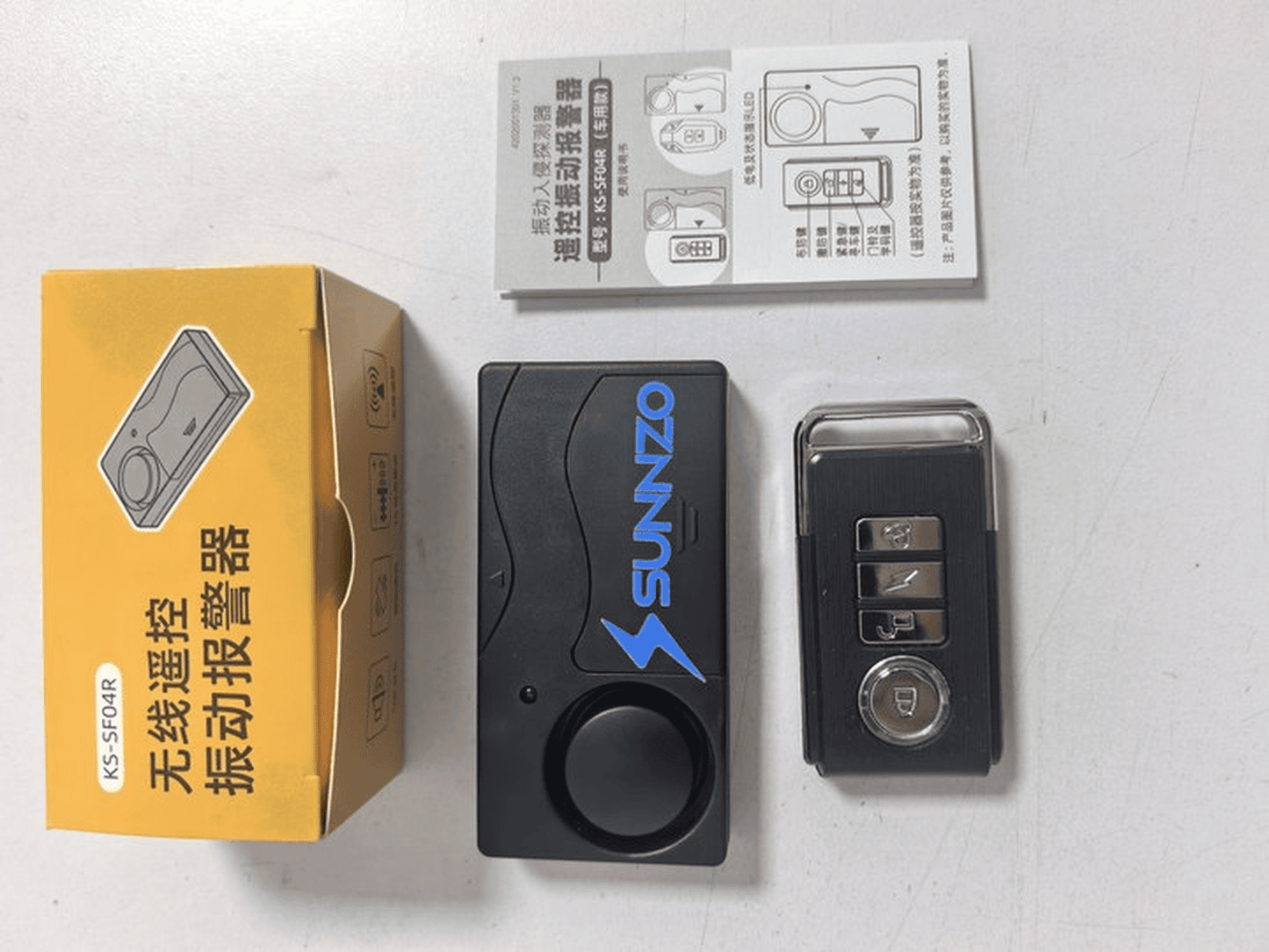 SUNNZO Parts for anti-theft automotive alarms, namely, electronic sensors, remote control transmitters and receivers for remotely operating land vehicles